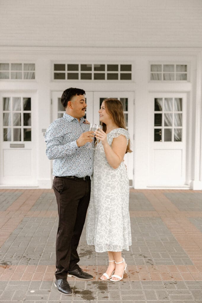 Arlington hall dallas engagement photos champange cheers