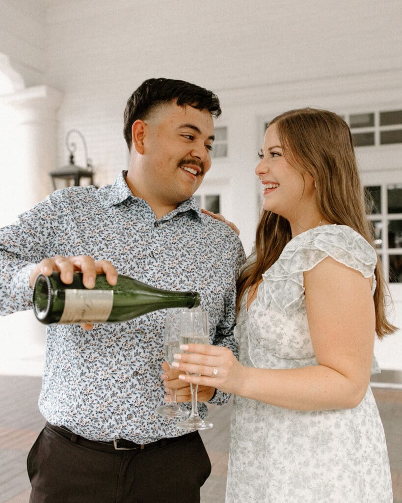 Arlington hall dallas engagement photos pouring champange