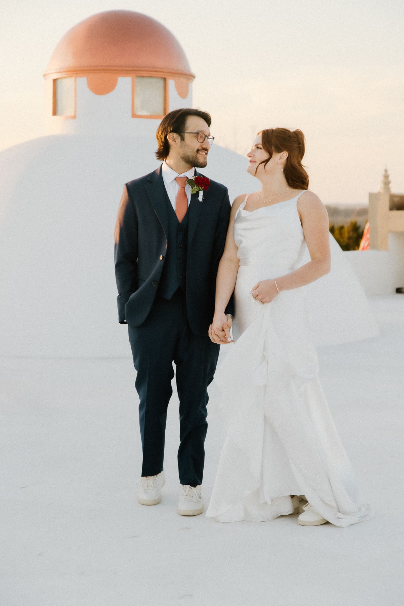 bride and groom dancing on the roof during their modern european inspired wedding at The Stony Ridge Villa in Texas