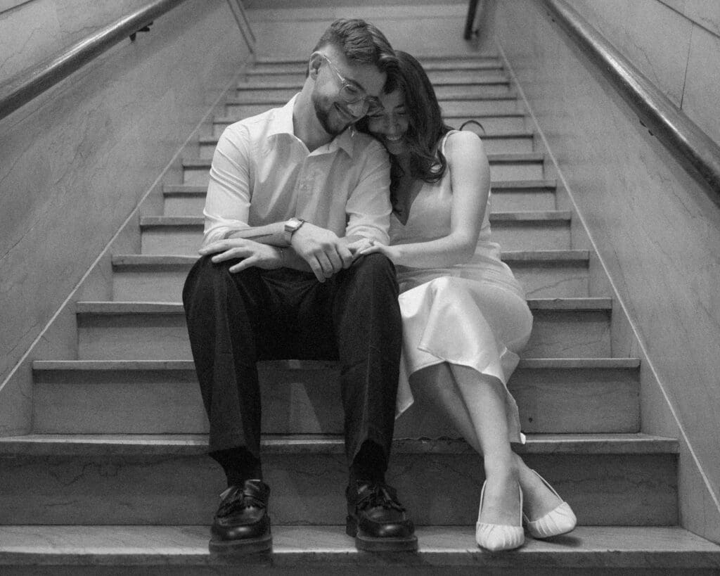 The kirby dallas engagement photos laughing on stairs