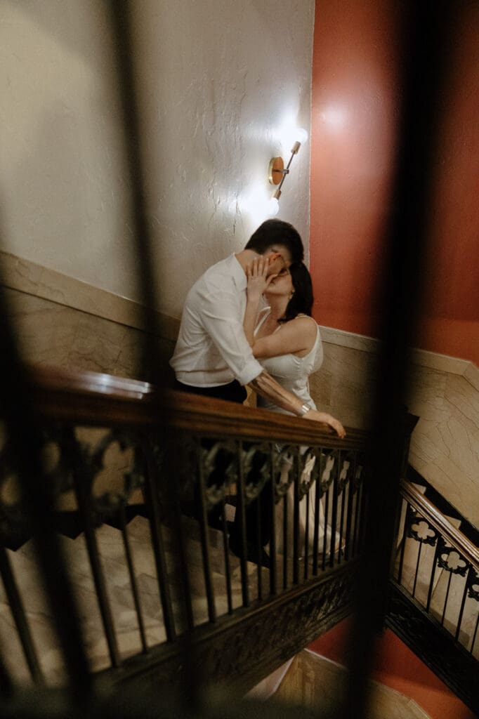 The kirby dallas engagement photos walking up stairs kissing
